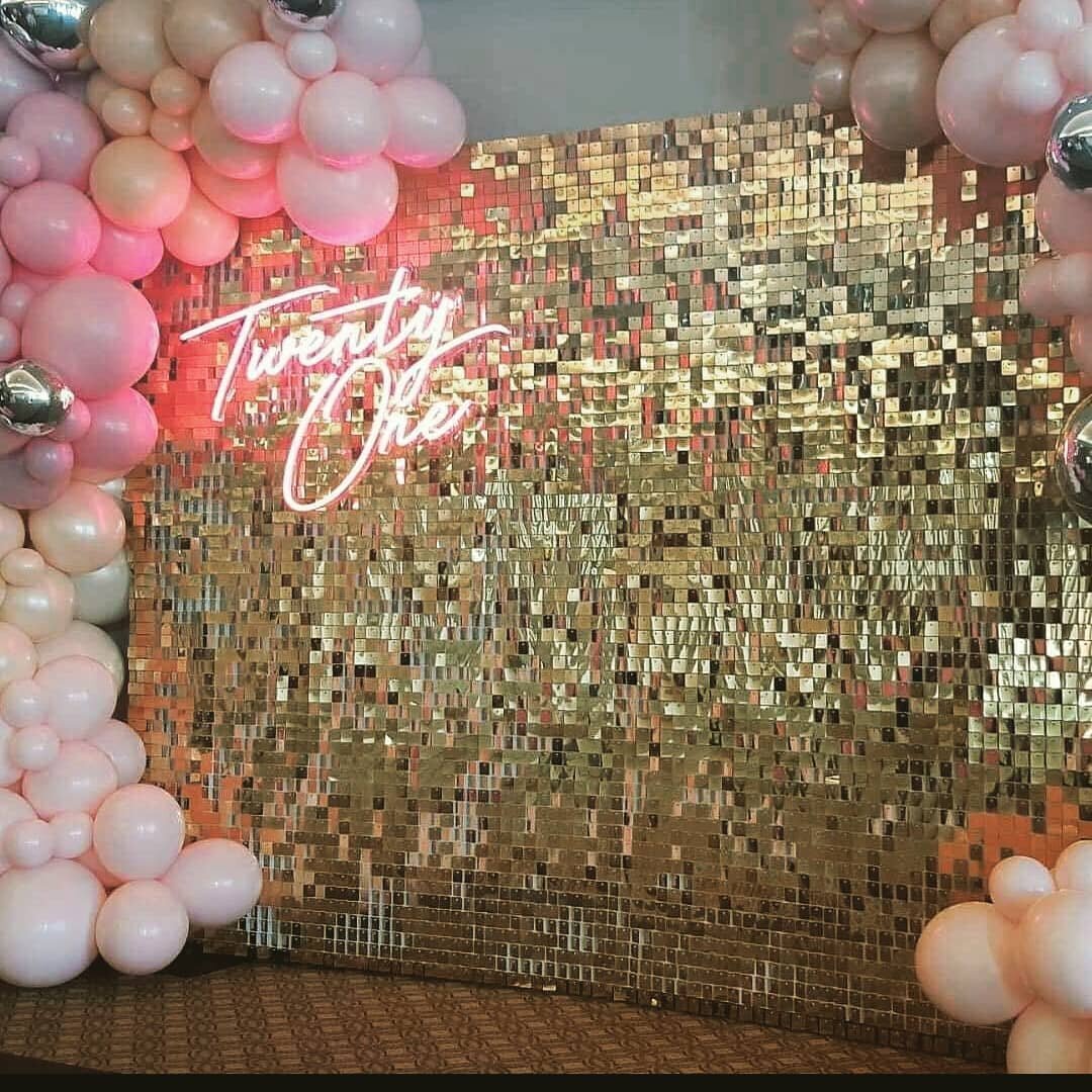 gold shimmer wall decor for a 21 birthday  party