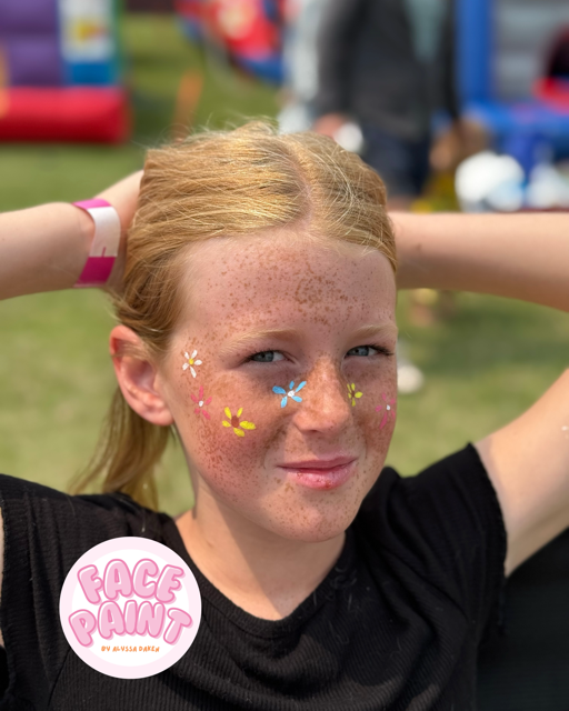 face-painting-by-alyssa-daken-rainbow-flower-freckles-face-paint-design