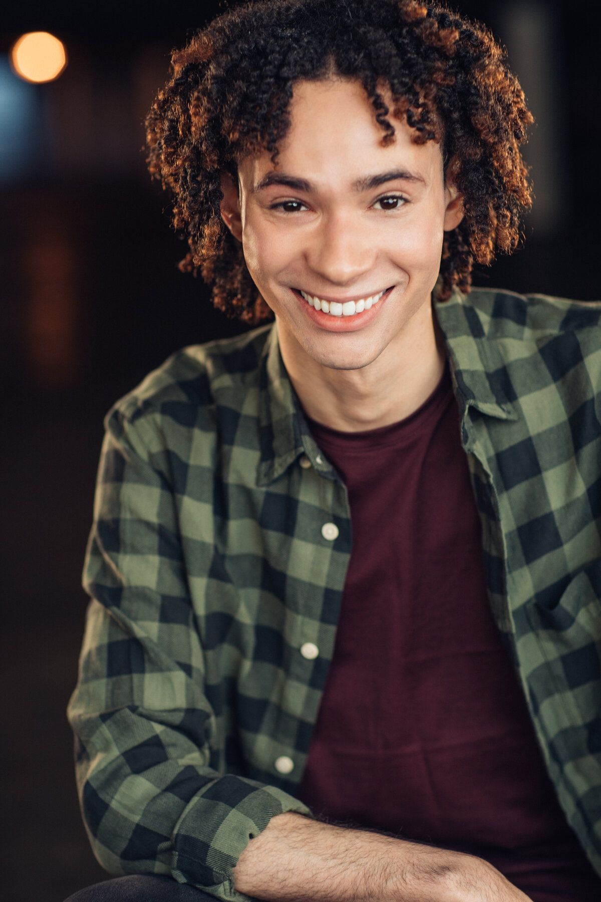 Young Man Wearing Green Checkered with Inner Maroon Shirt Headshot in LA
