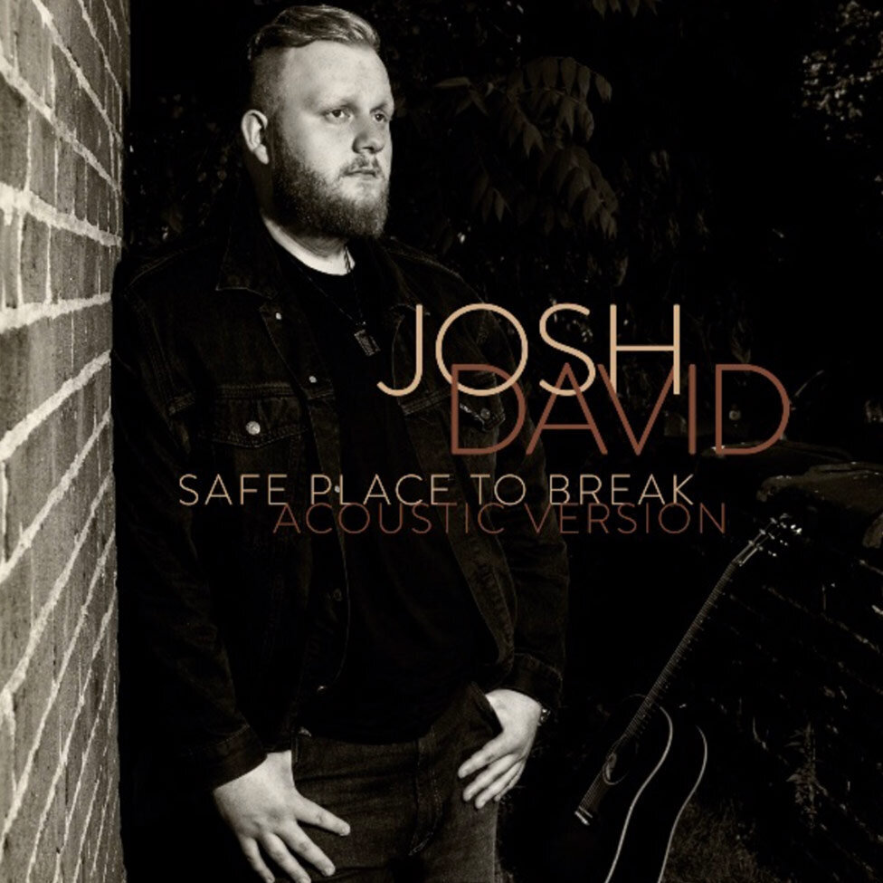 Nashville Single Cover Title Safe Place To Break Artist Josh David standing against brick wall guitar beside him black and white