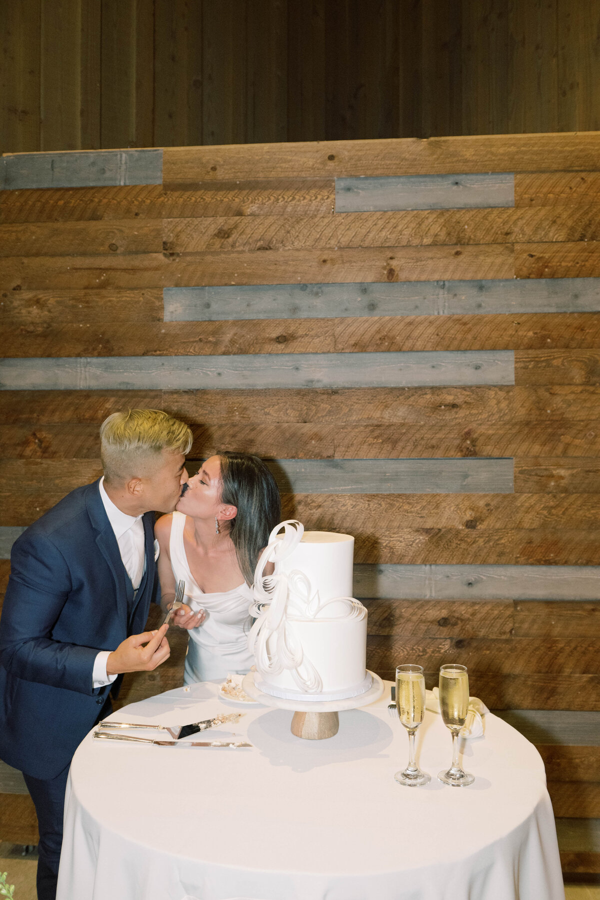 Couple Cutting Wedding Cake Cleveland Ohio