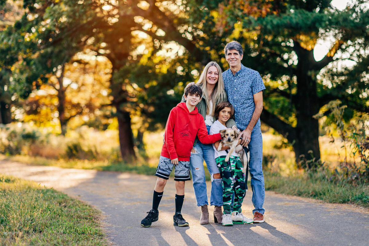 family-with-dog-sunset