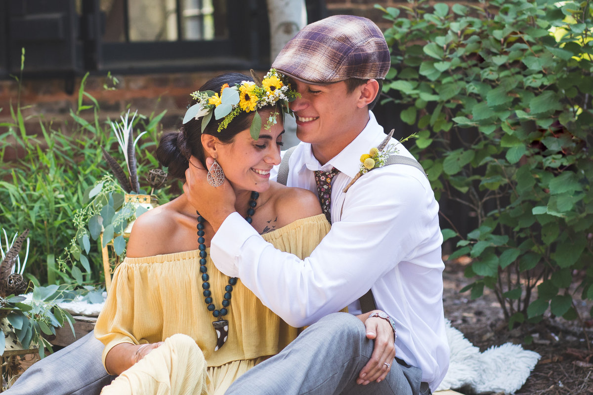 Romantic pose of young couple in vintage outfits for engagement session