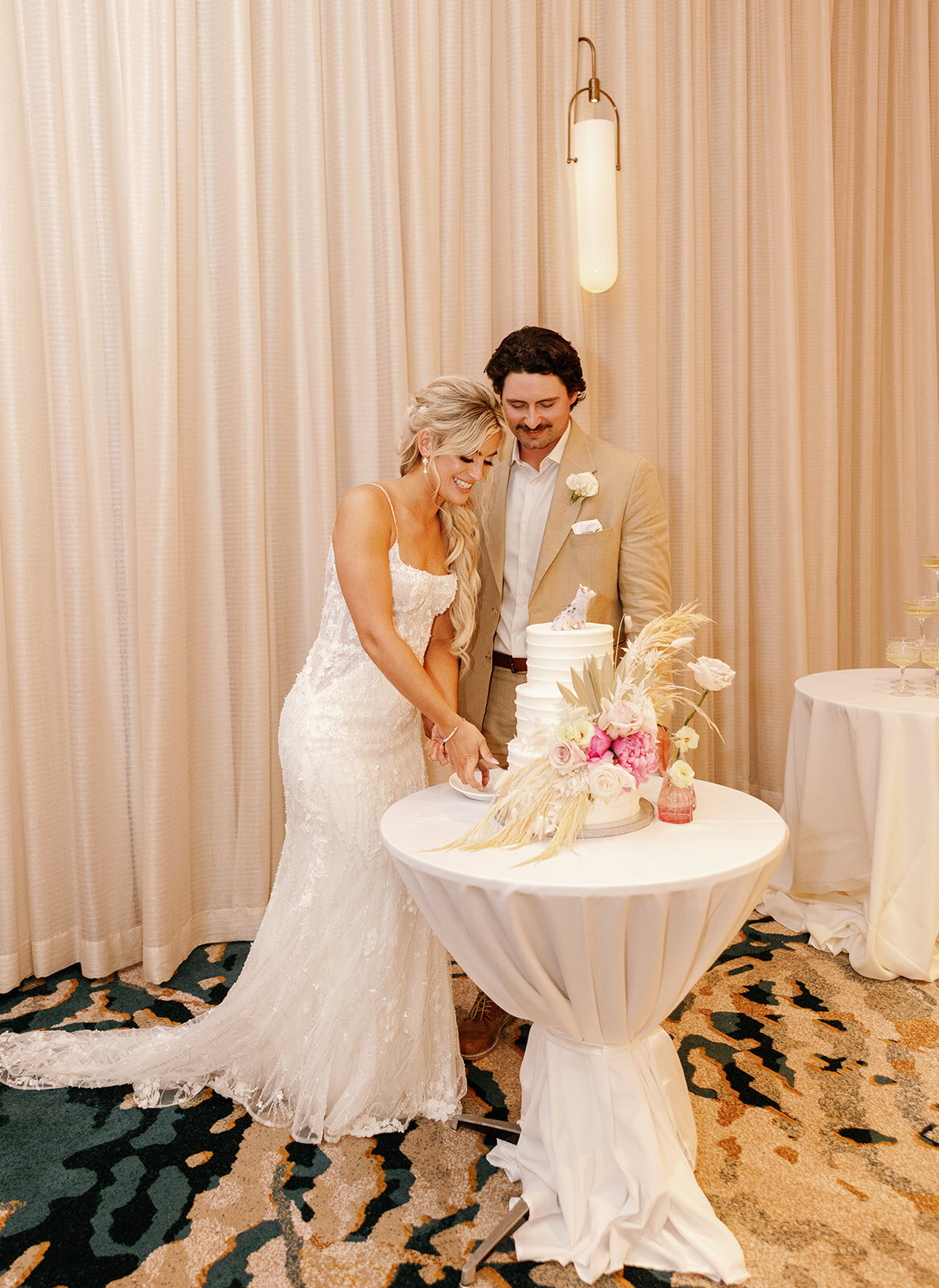 Brenda & Stephen sharing a sweet moment during their cake-cutting ceremony.