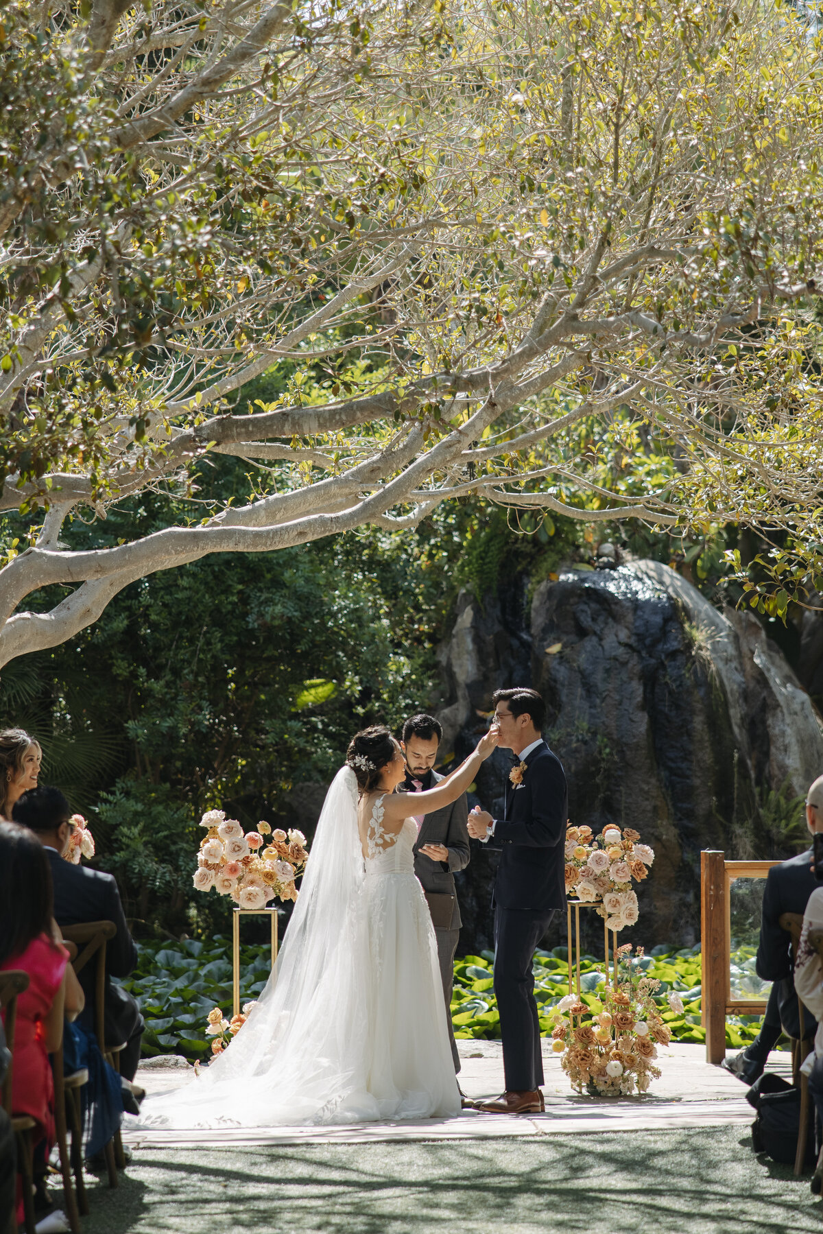 bride and groom first kiss, wedding ceremony kiss
