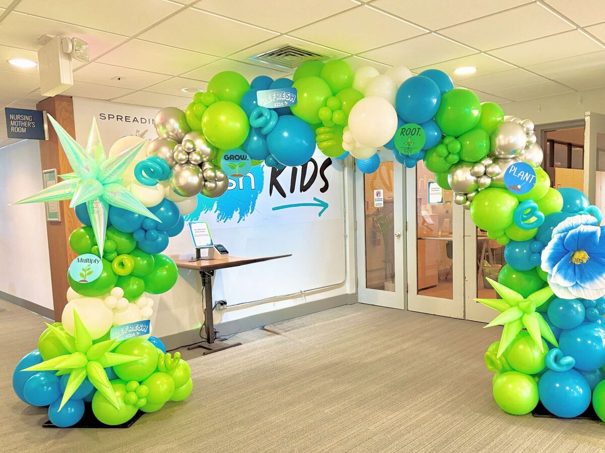 balloon arch and stars for community event in STL by Dreamsc8pe Event Co