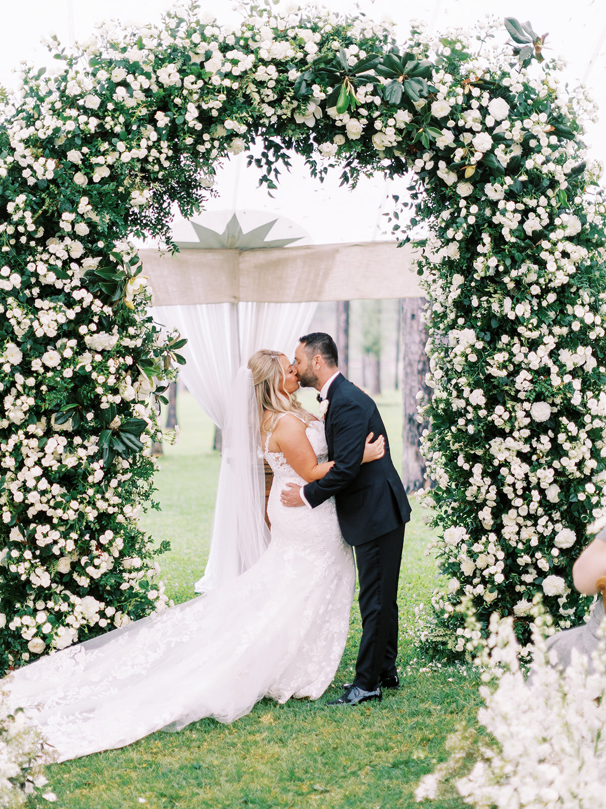 bride-groom-wedding-floral-arch