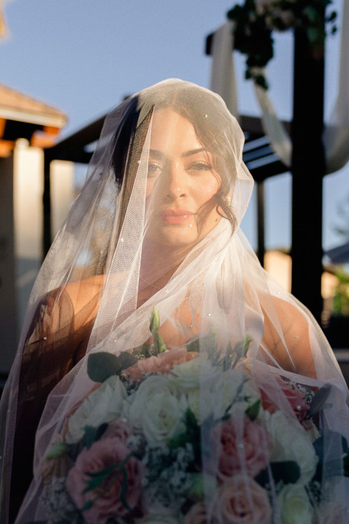Editorial bride portrait during sunset.