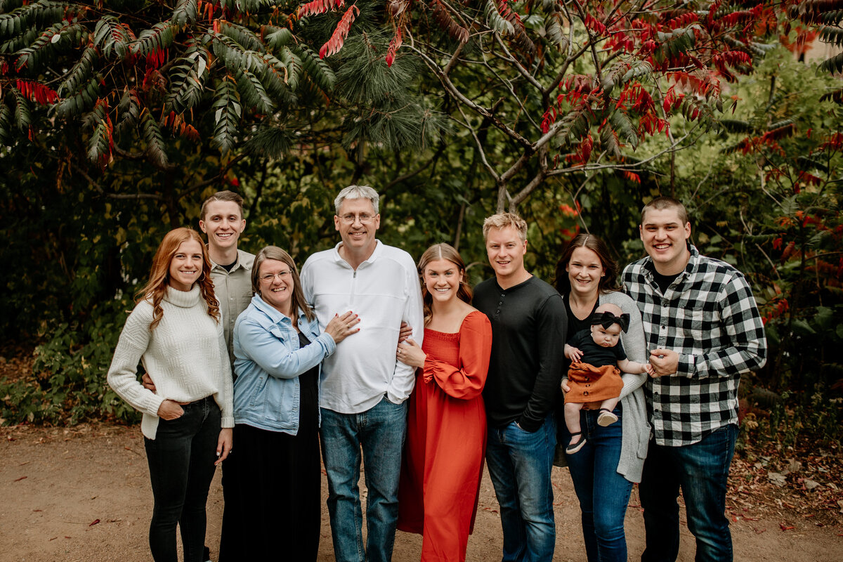 Sweet family of 9 gathers in downtown St. Paul for Fall family portraits.