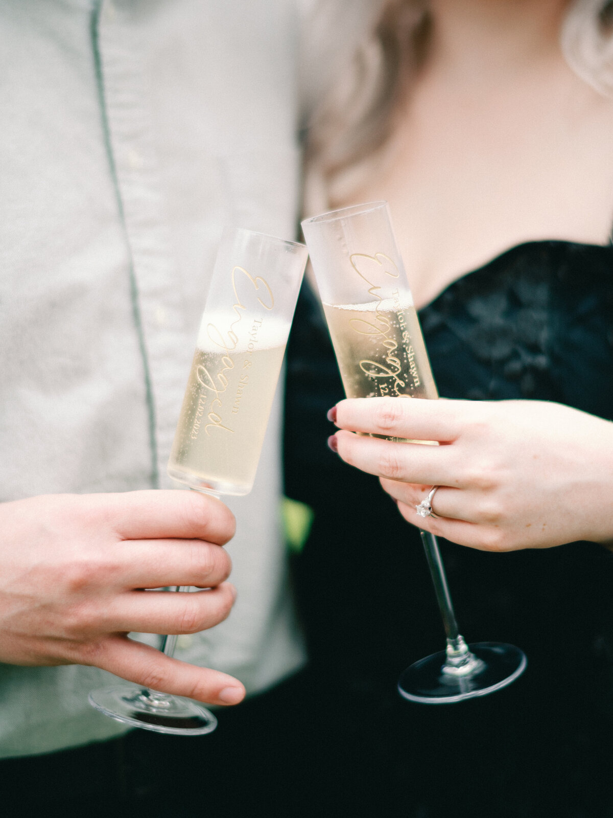 engaged couple with champagne at river oaks garden club in houston texas