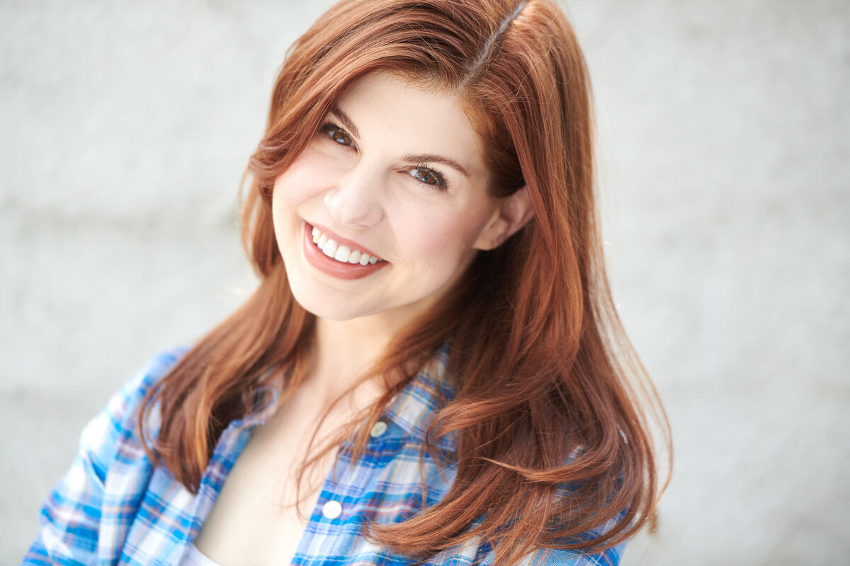 Professional Headshot Photographer in St. Paul Captures Joyful Expression in Studio Setting-06