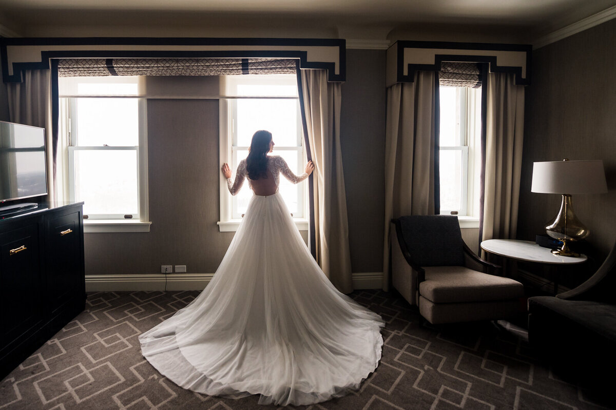Bridal portrait inside hotel room at Fairmont Hotel, classic and experienced, Edmonton wedding venue, featured on the Brontë Bride Vendor Guide.