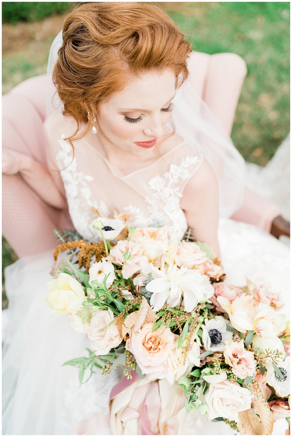 Bride with red hair and white and pink bouquet