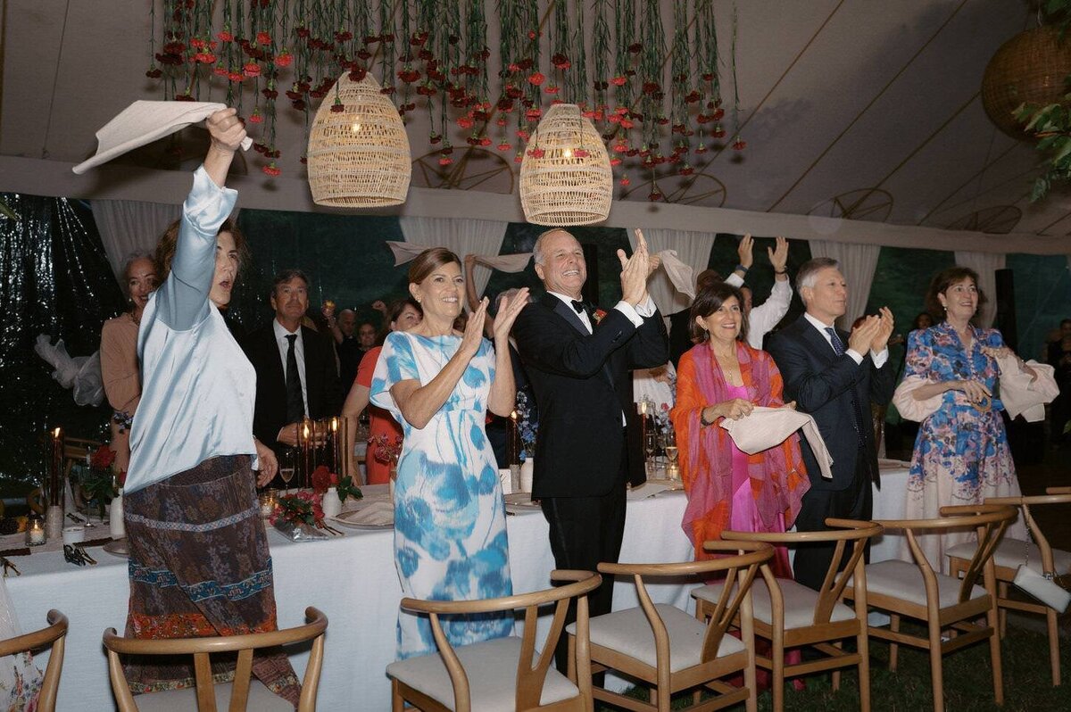 troutbeck-19-guests-cheering-during-toasts-at-wedding-reception-at-troutbeck-jenny-fu-studio