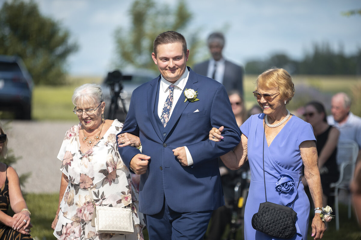 Groom preparation candid reflection in mirror
