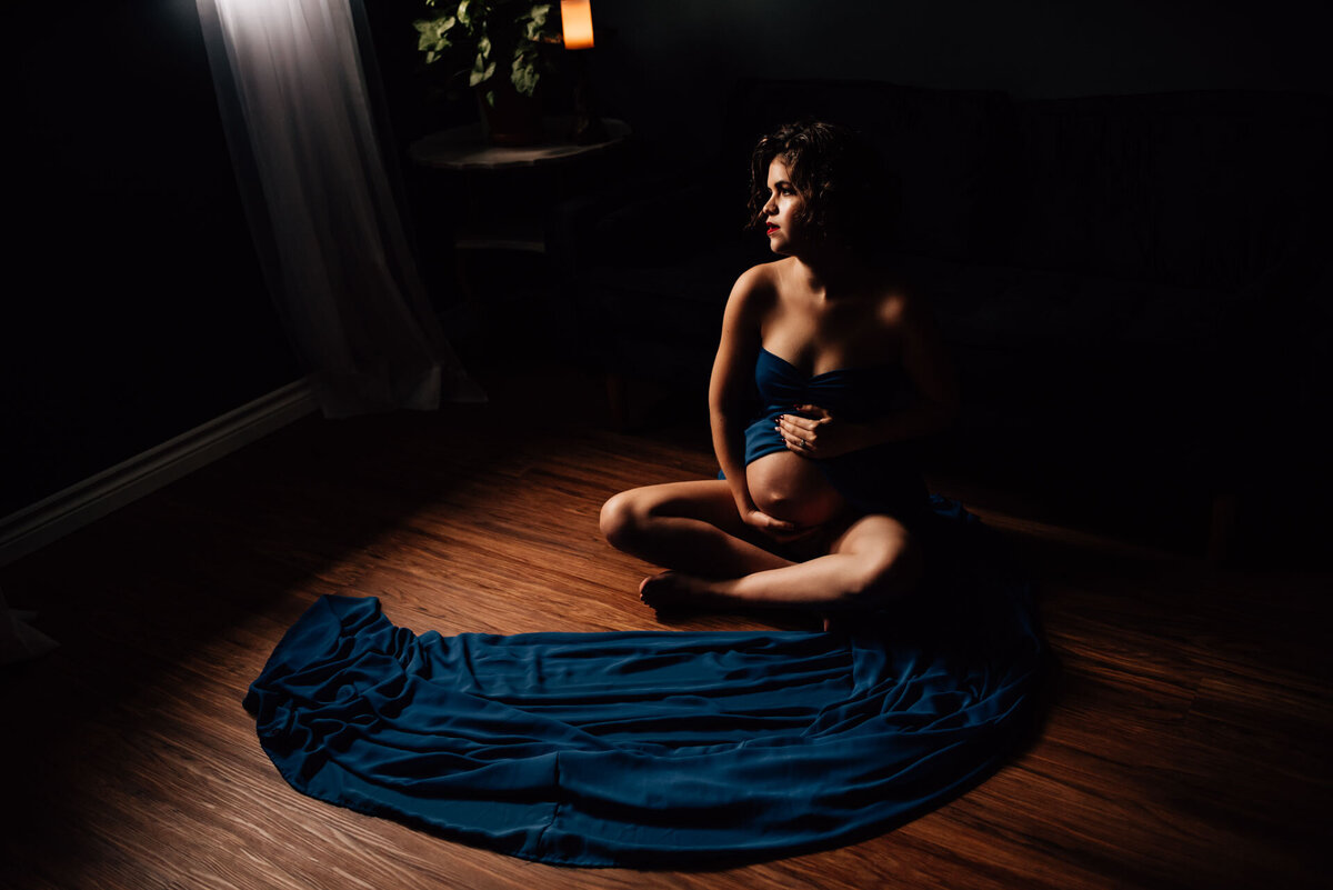 woman wearing long dress for Ottawa Maternity Boudoir Photos