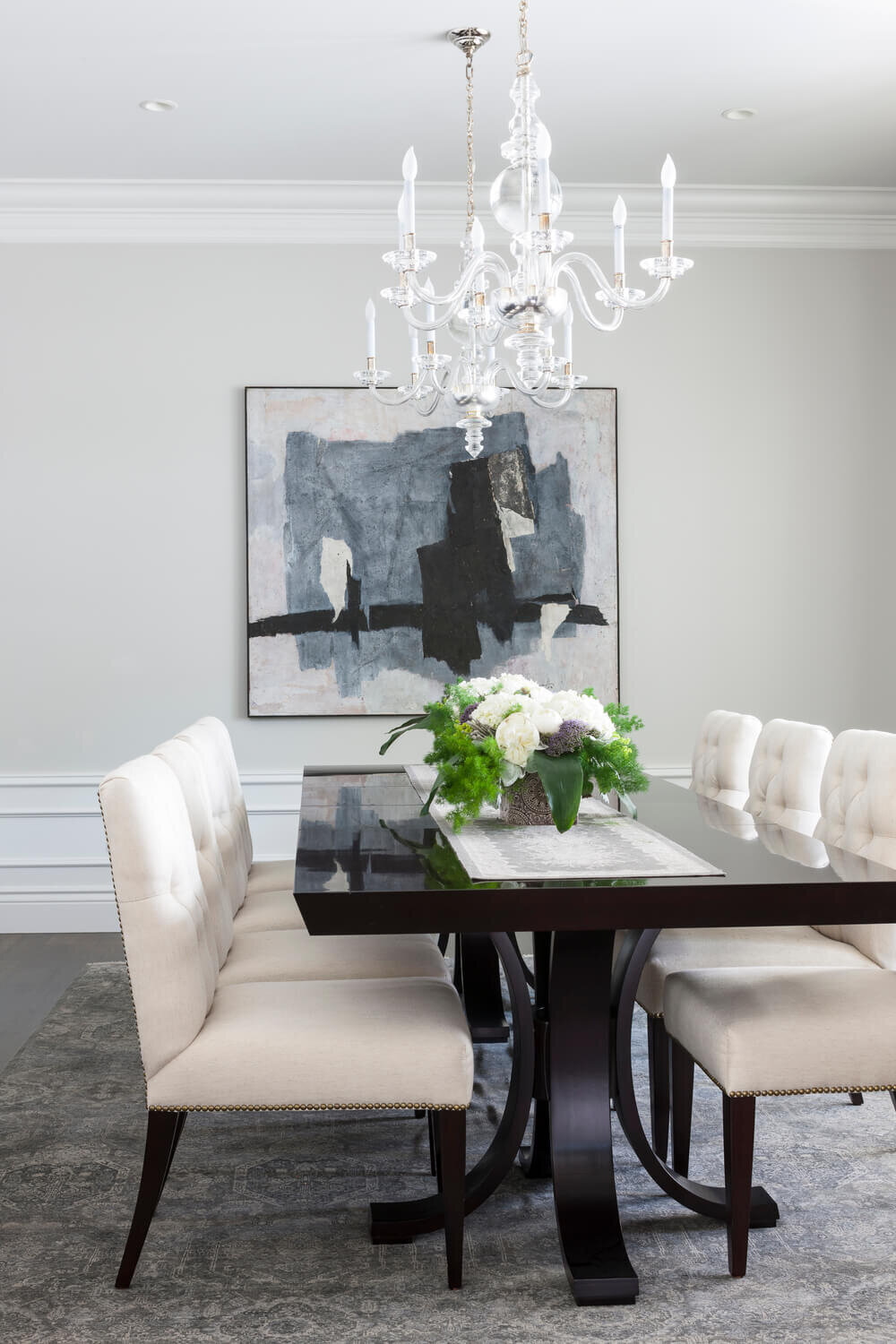 Long-black-dining-table-white-tufted-chairsjpg