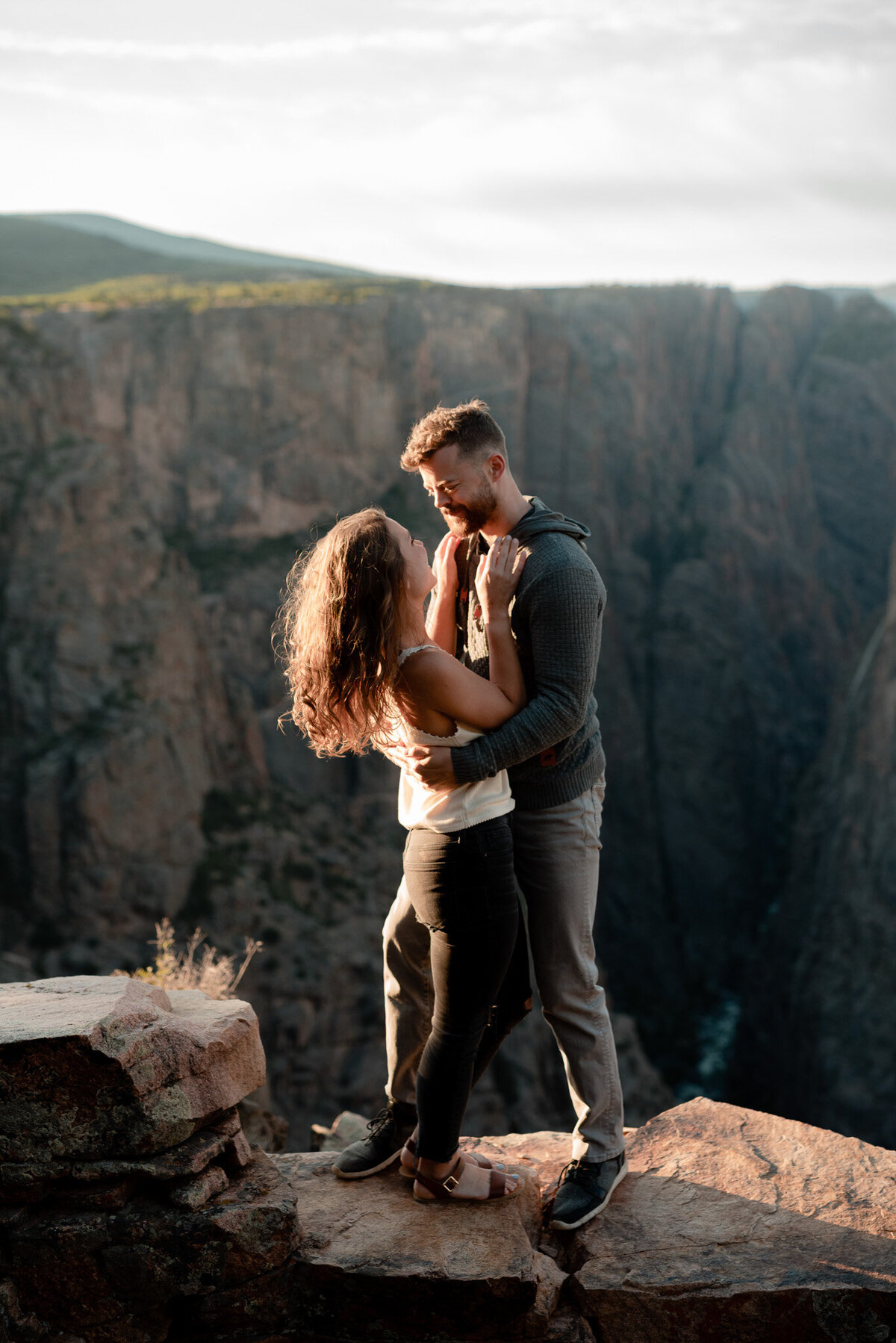 Colorado couple recently engaged pictured embracing