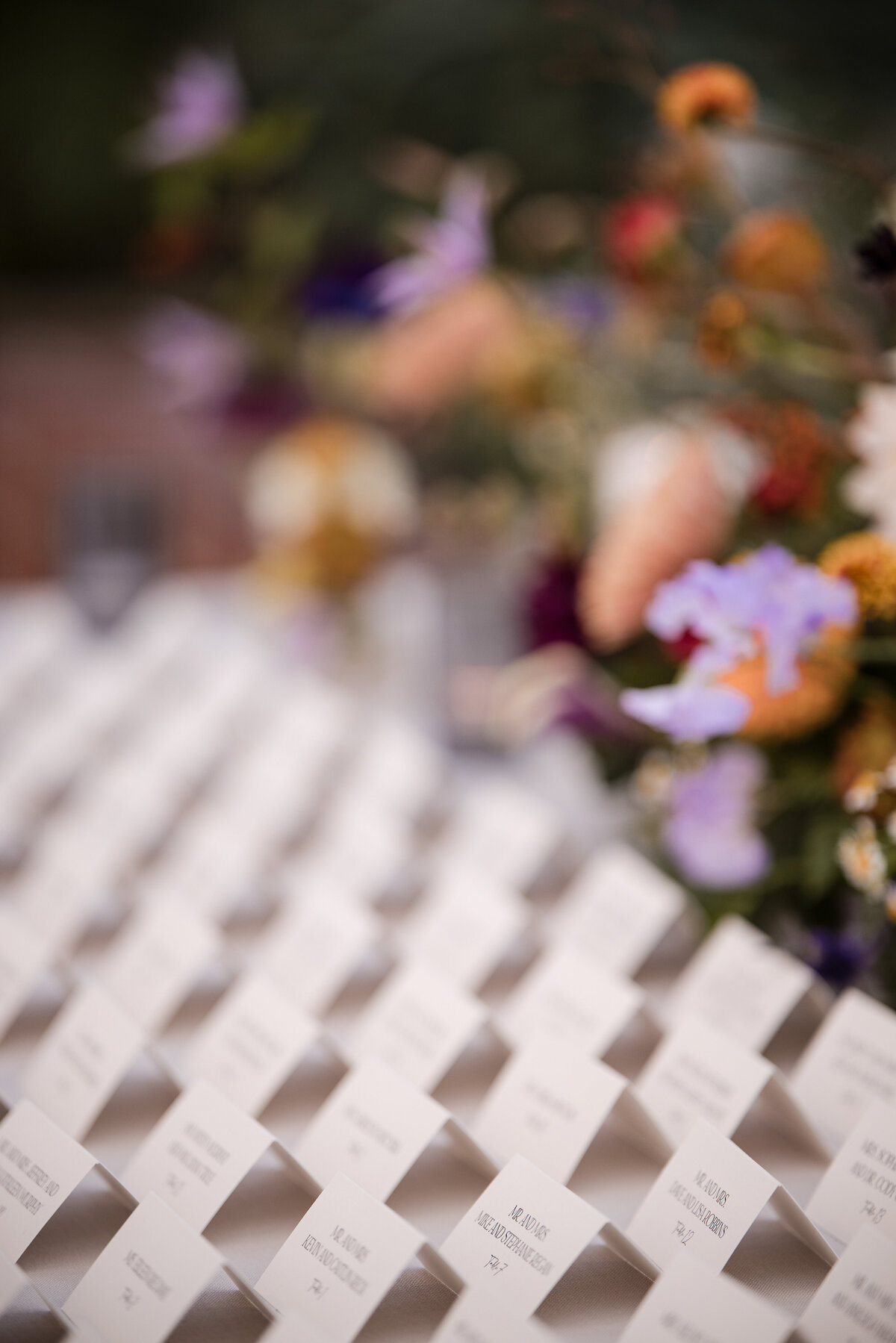 Place card table with flowers at a  Fairmount Park Horticulture Center wedding