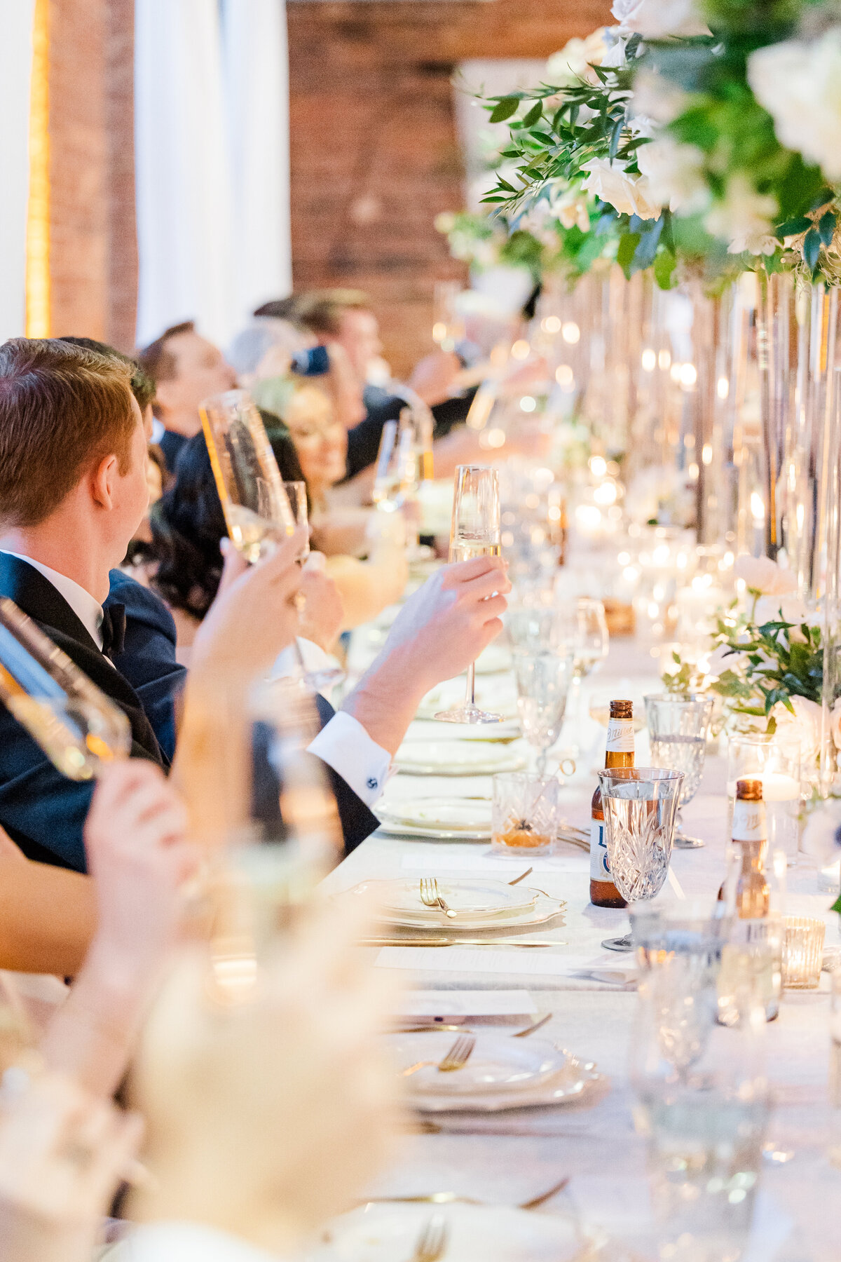 guests toasting during reception at the huguenot loft