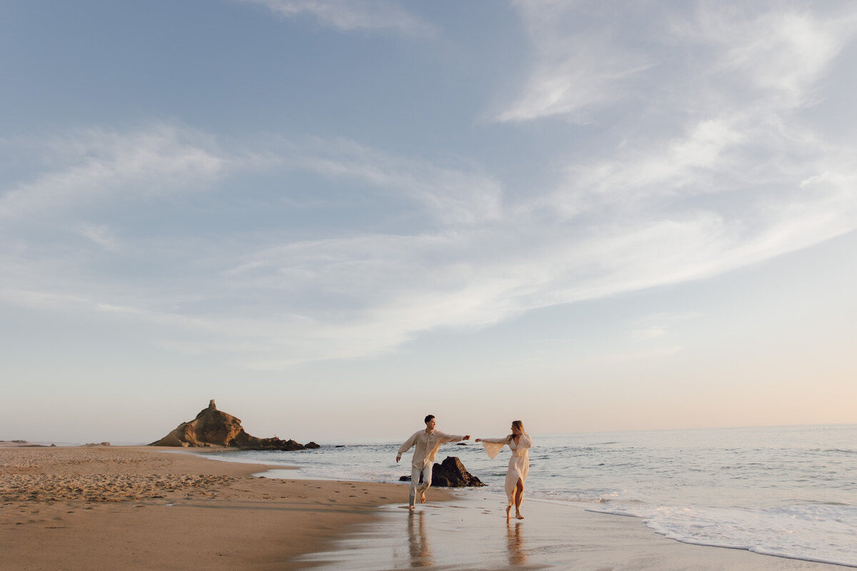 couple dancing on the beach
