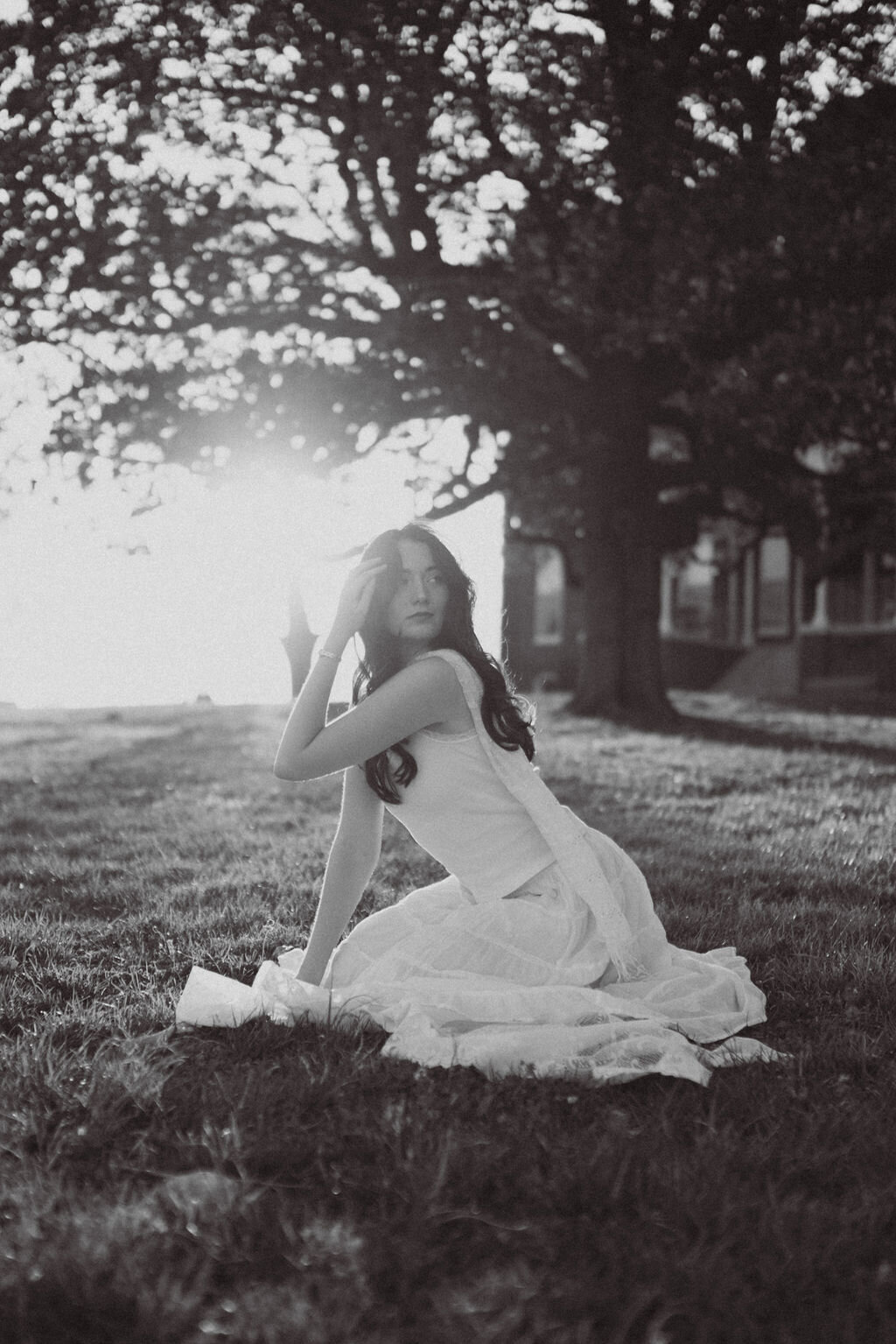 girl sits in lakeshore park in knoxville tennessee