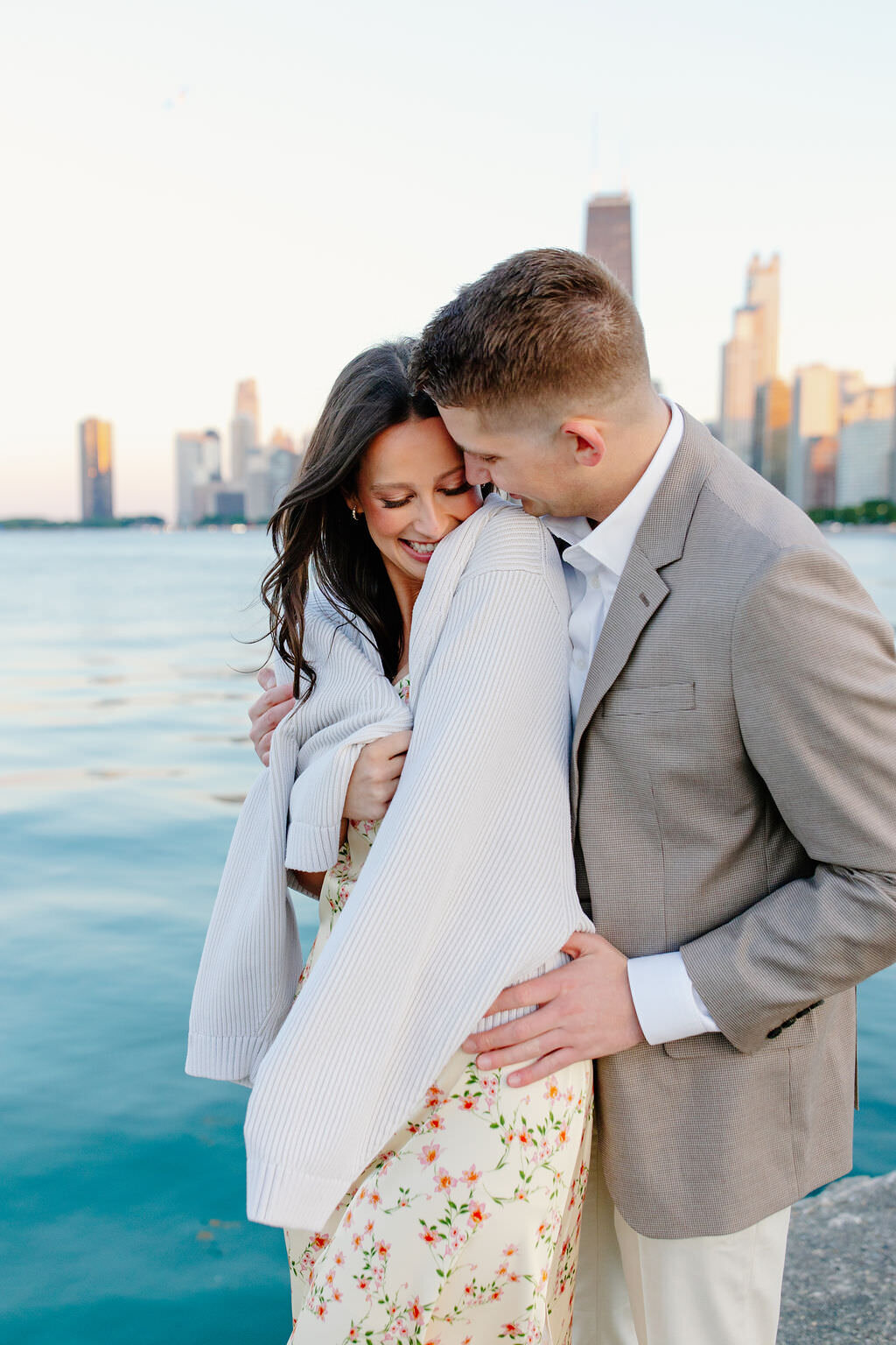 An engagement photography session at The Wrigley Building and North Ave Beach in Chicago, Illinois - 19