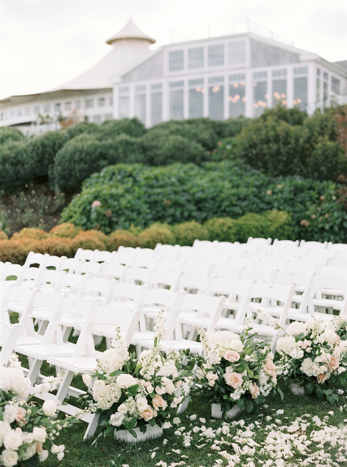 Garden inspired wedding ceremony with floral aisle for a Cape Cod Wedding by luxury Cape Cod wedding planner and designer Always Yours Events