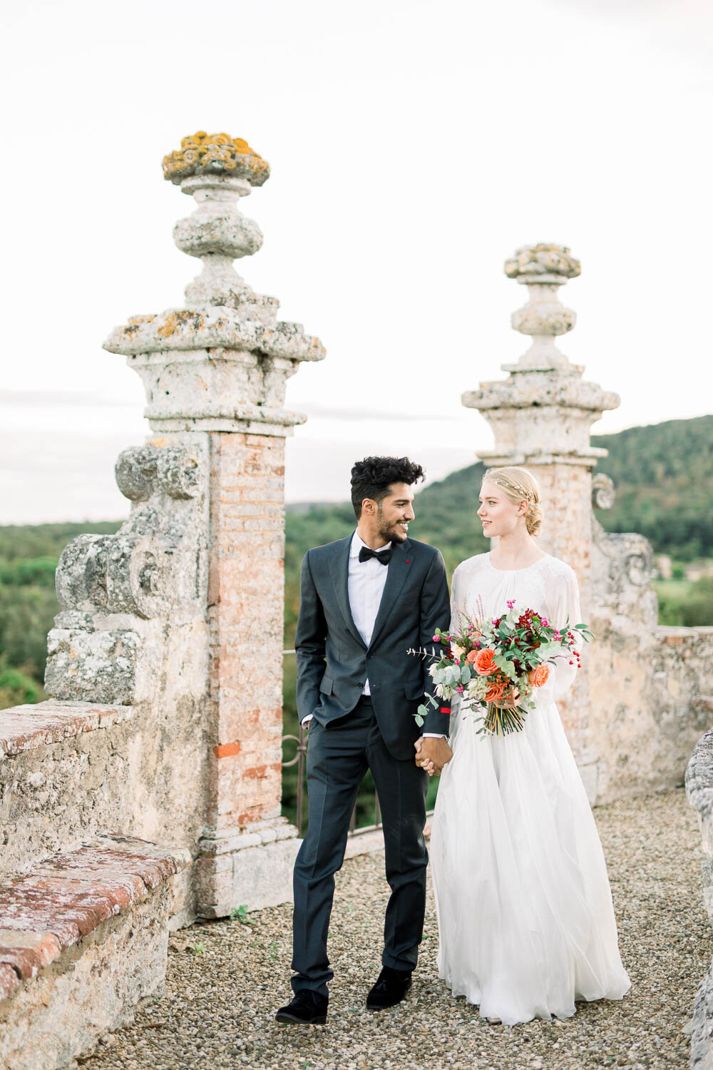 stunning. bride and groom in gardens of castello di celsa