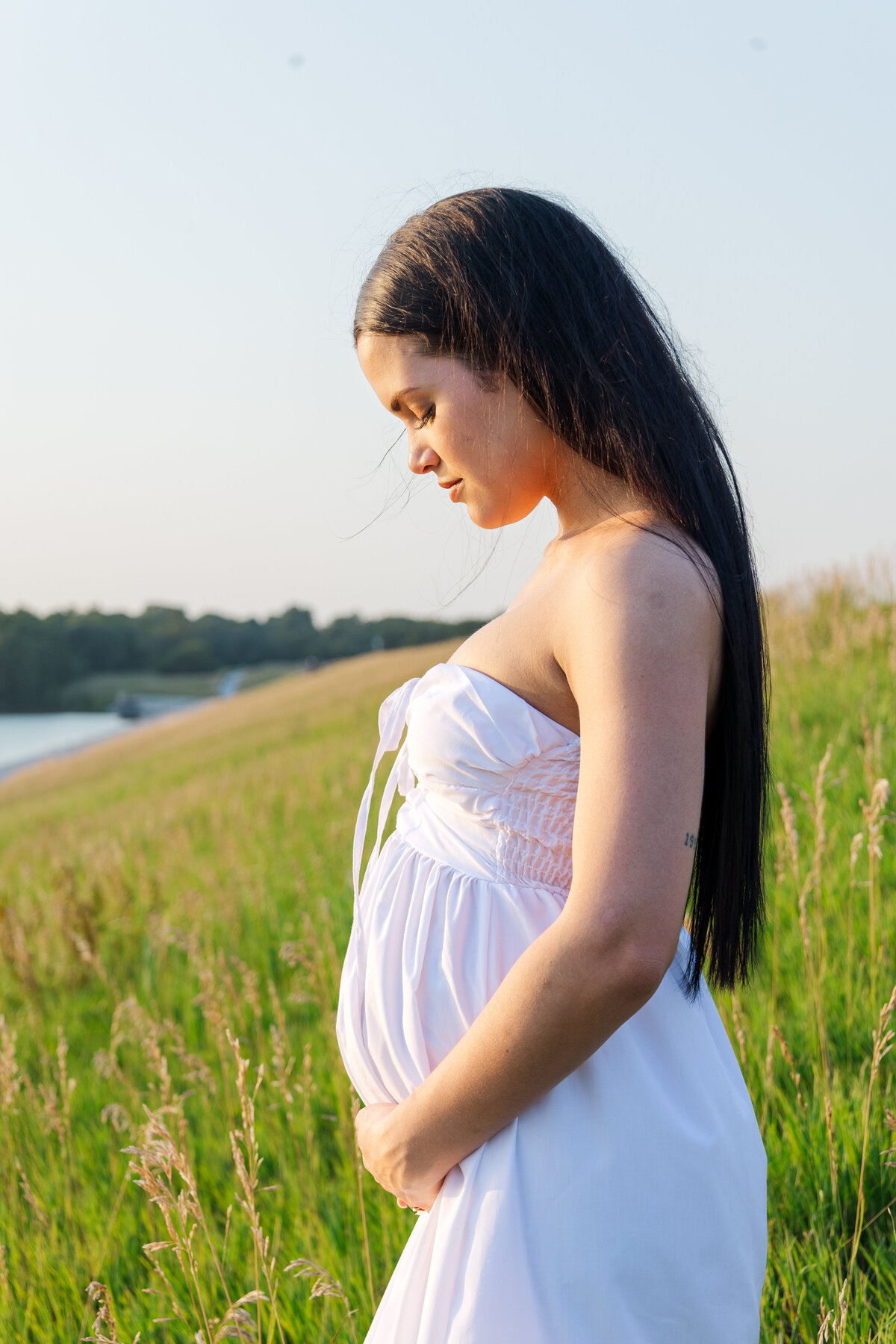 Pregnancy announcement photography by Claire Katan Creative.