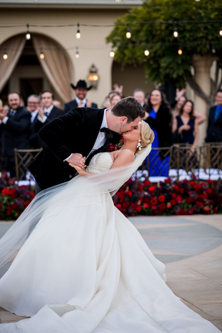 Kiss and dip, champagne drapery, ballgown, black tux, velvet, gold chairs