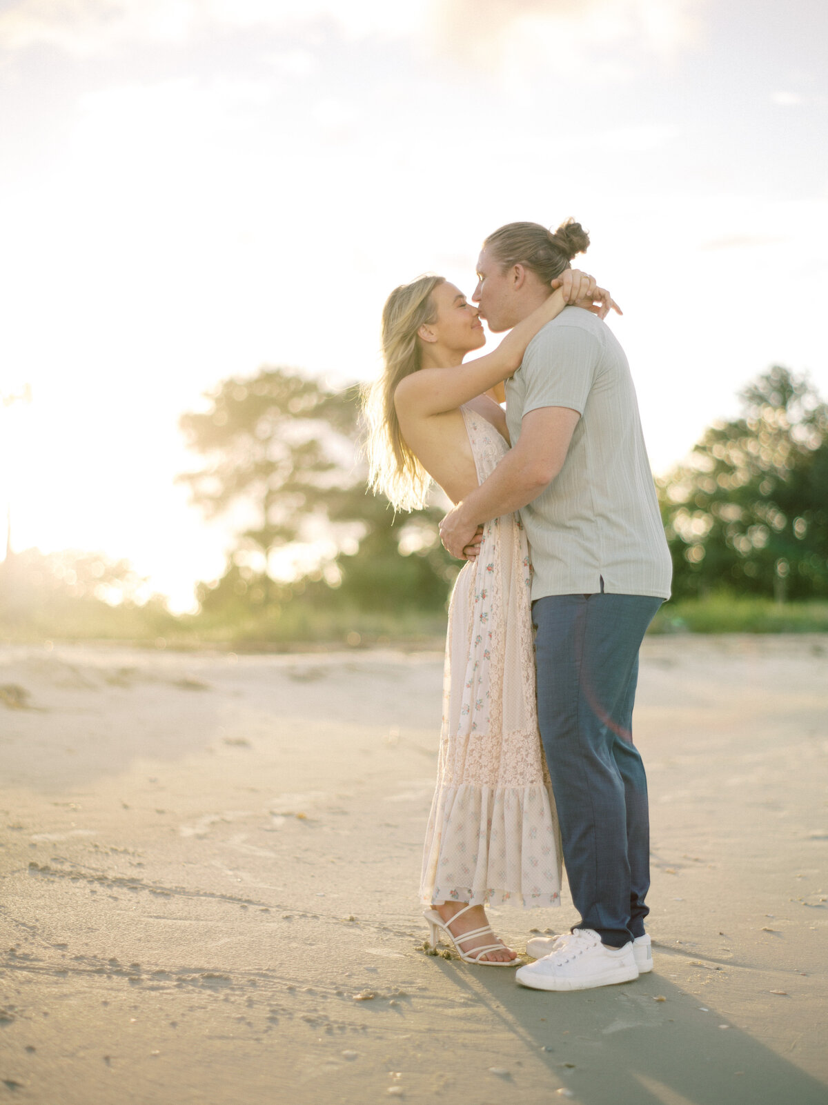 Engagement photos on the beach in Charleston. Photography by Philip Casey.