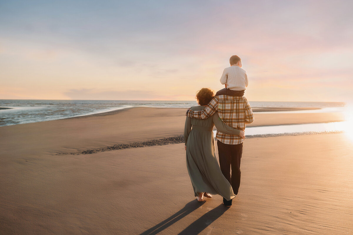 Family embraces each other during Family Portraits on Kiawah.