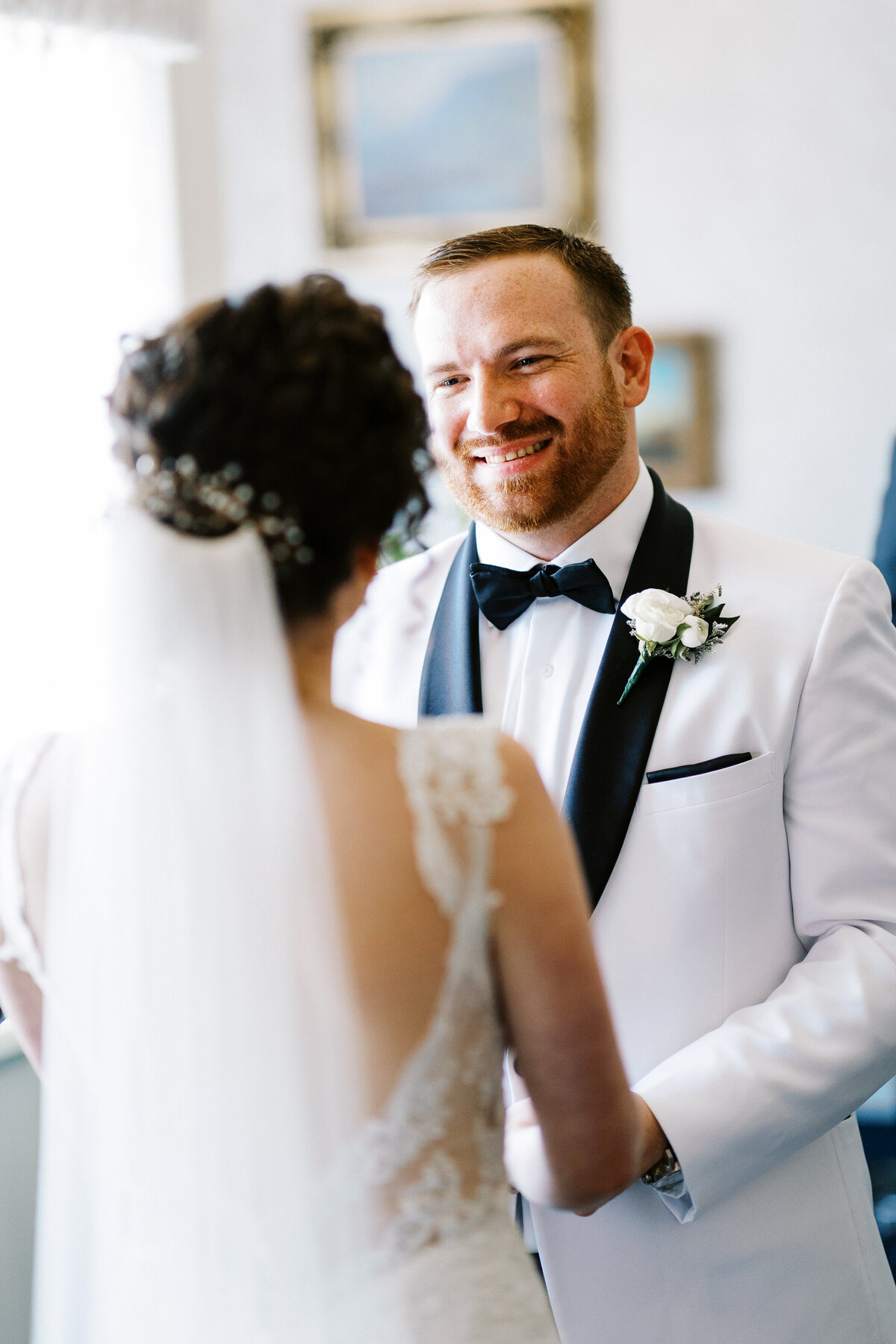 close up of the groom looking in her eyes with joy  at the ceremony before the kiss at St James Hotel