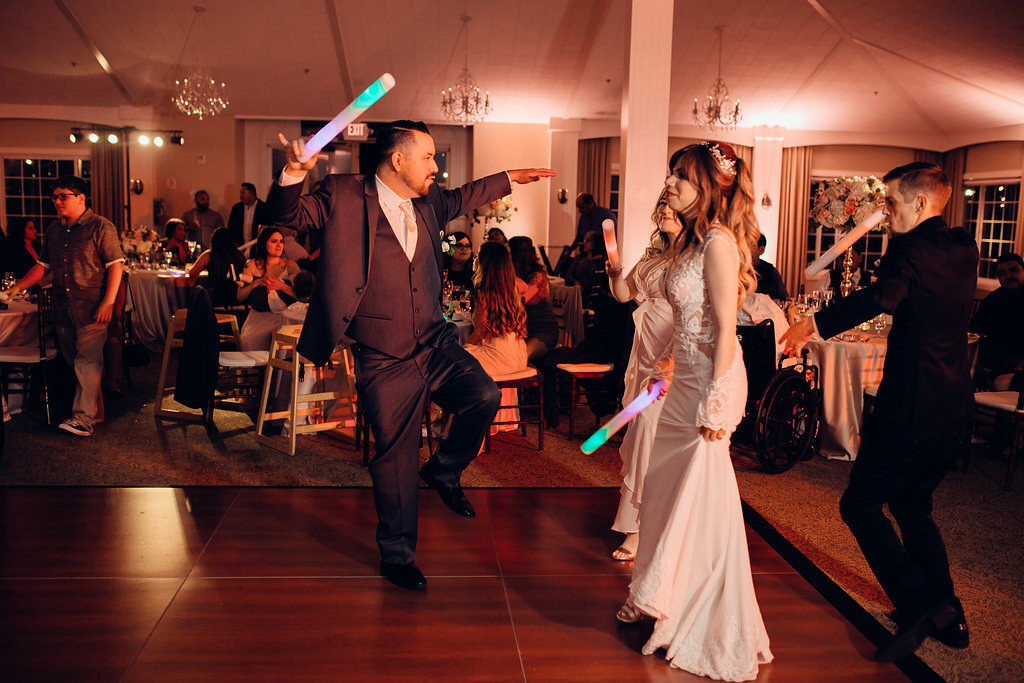 Wedding Photograph Of The Crowd Dancing In The Dance Floor Los Angeles