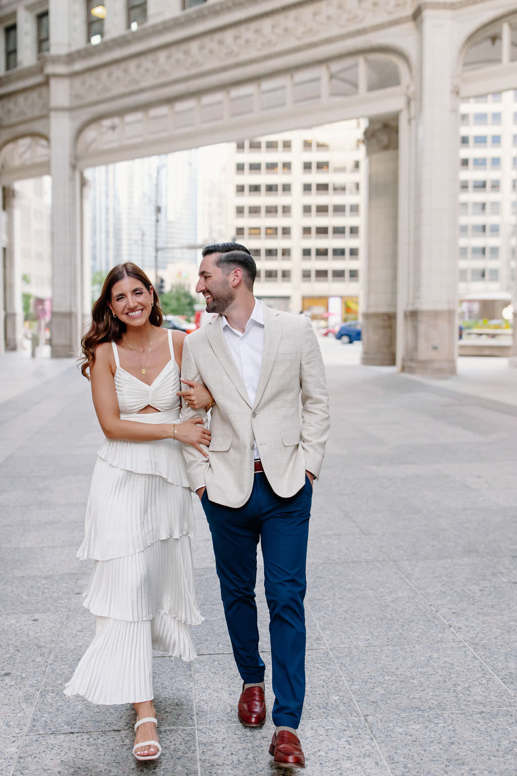 An engagement photography session at The Wrigley Building and North Ave Beach in Chicago, Illinois - 19