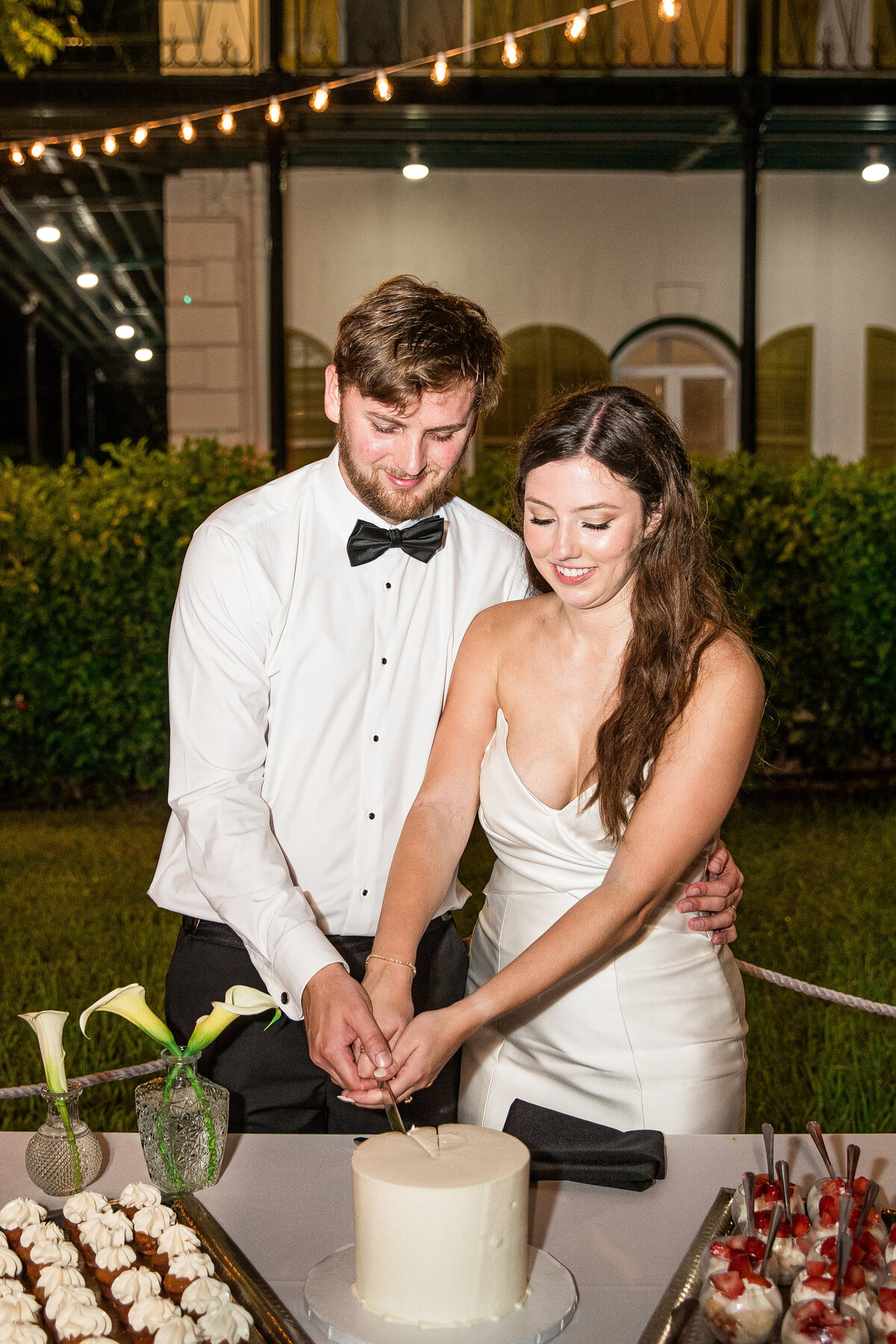 4  LAUREN AND BRYCE - hemingway home weddings - little miss planner key west - great events catering - jannette dellanos photography - cjfwedding films - marathon florist - eventfully yours rentals -