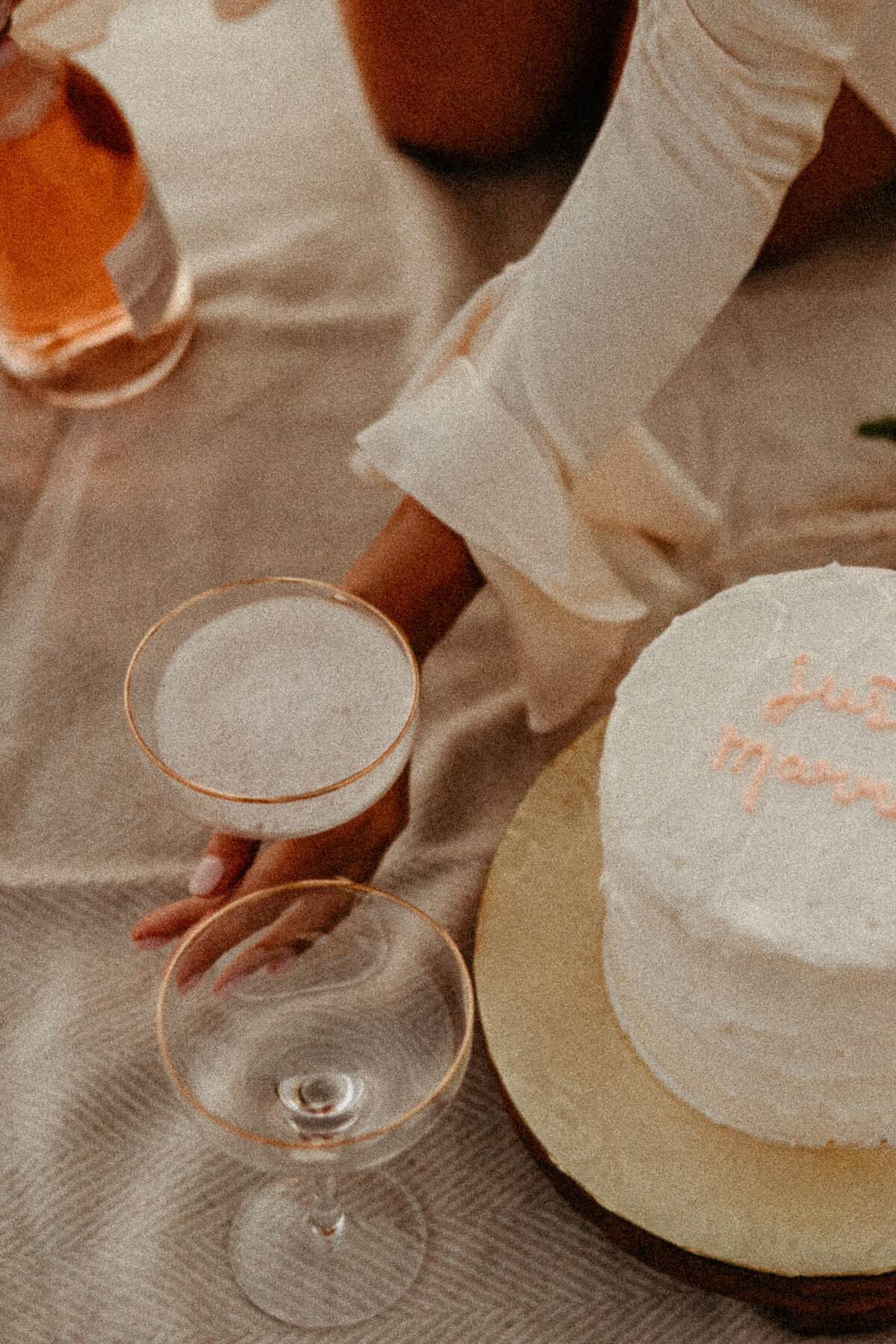 California Sunset Cliffs Elopement Cake with Champagne