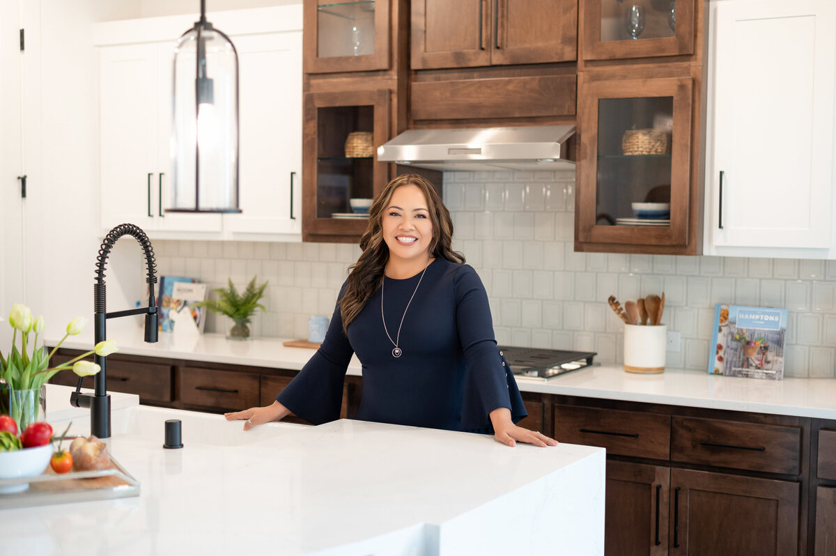 Marilly Mendez sitting in modern kitchen for personal branding shoot in Houston
Jonathan Blake-9	Editorial Portrait - Fashion-Inspired Branding	Jonathan Blake seated in vintage chair for creative personal brand session in Houston
