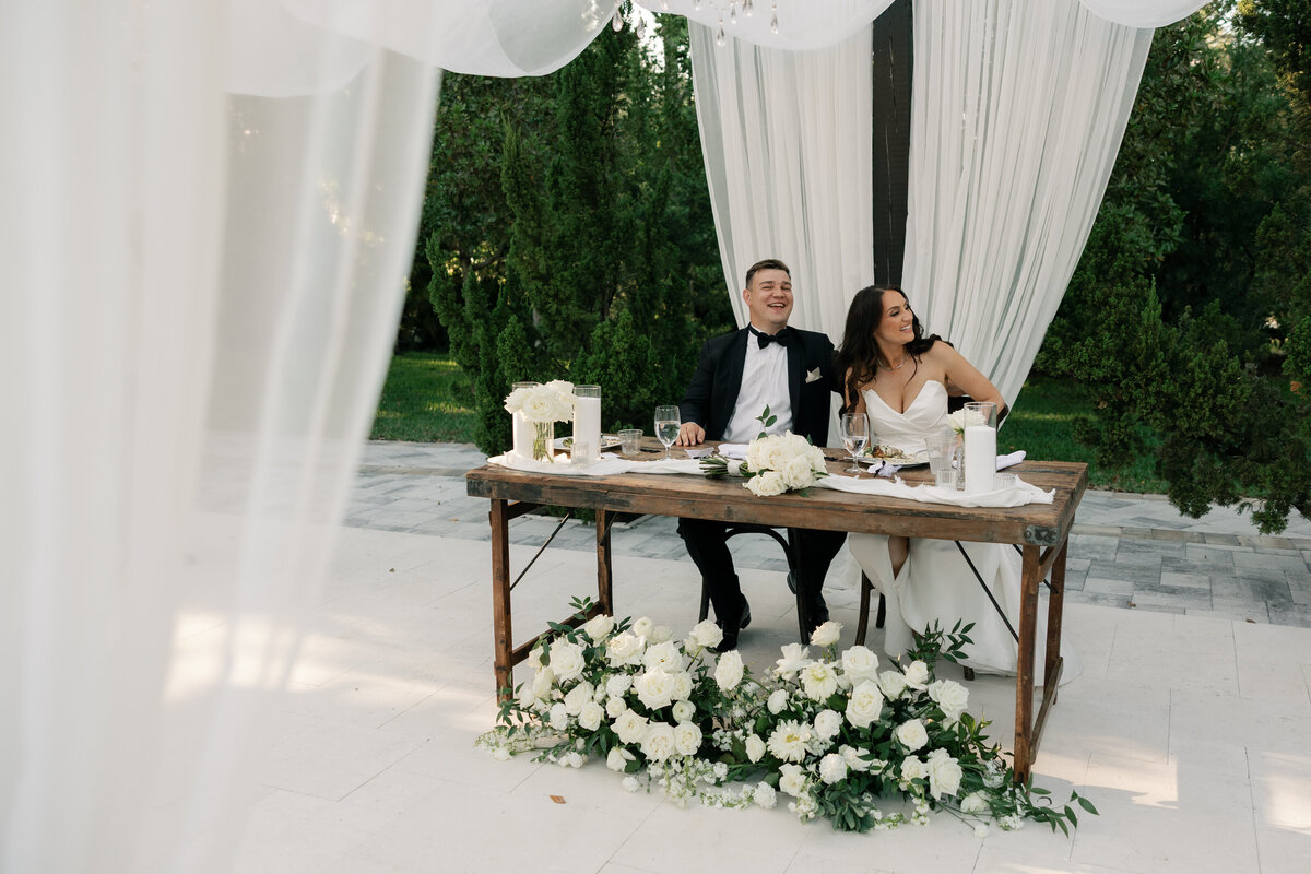 Candid Laughing during speeches at La Casa Toscana Wedding Venue Fort Myers Florida