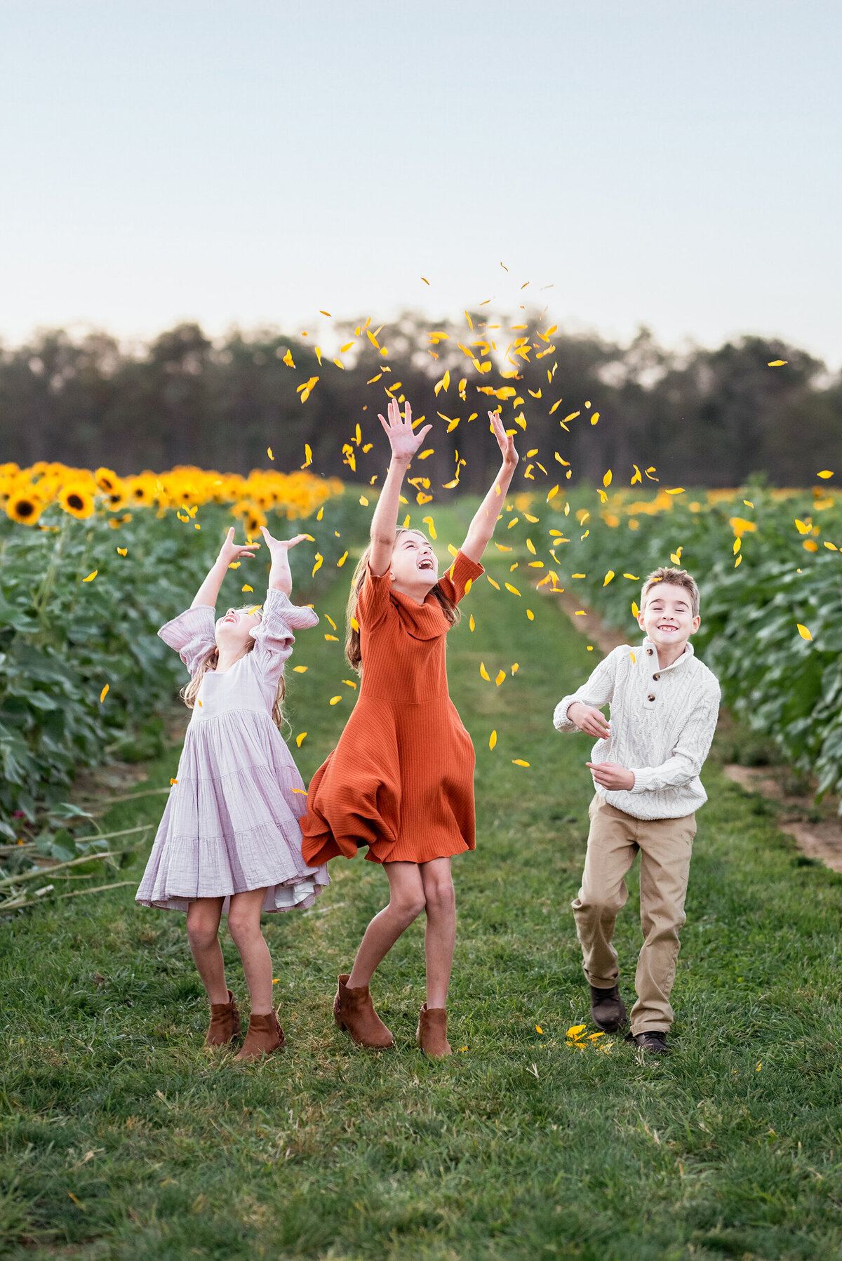 Hoboken, New Jersey, Jersey Shore, Jersey City, NJ, New York, New York City, NYC, NY, family photographers, family pictures, Hoboken photographer, lifestyle pictures, lifestyle photographs, Hoboken Sunflower Field Mini Session, siblings photo, sister brother sister, big sister, little sister, middle sister, big brother, little brother, middle brother, sunflower fields, sunflower fields photo shoot, sunflower fields photography session, season photo shoot, mini photoshoot, photographer near me in Hoboken NJ