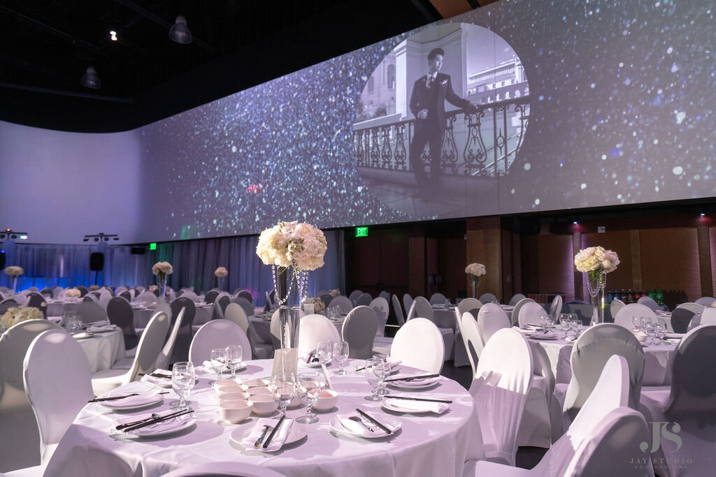 All white wedding reception setup at Infinity Park in Glendale Colorado.