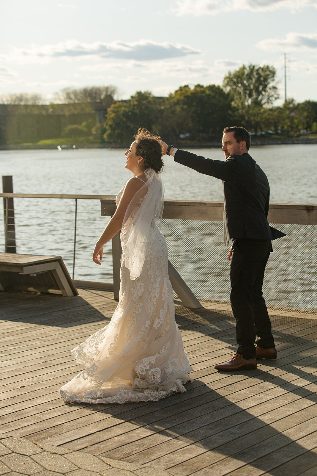 Bride and groom dancing on City Deck in Green Bay waterfront