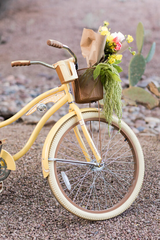 yellow-bicycle-with-flowers-in-basket