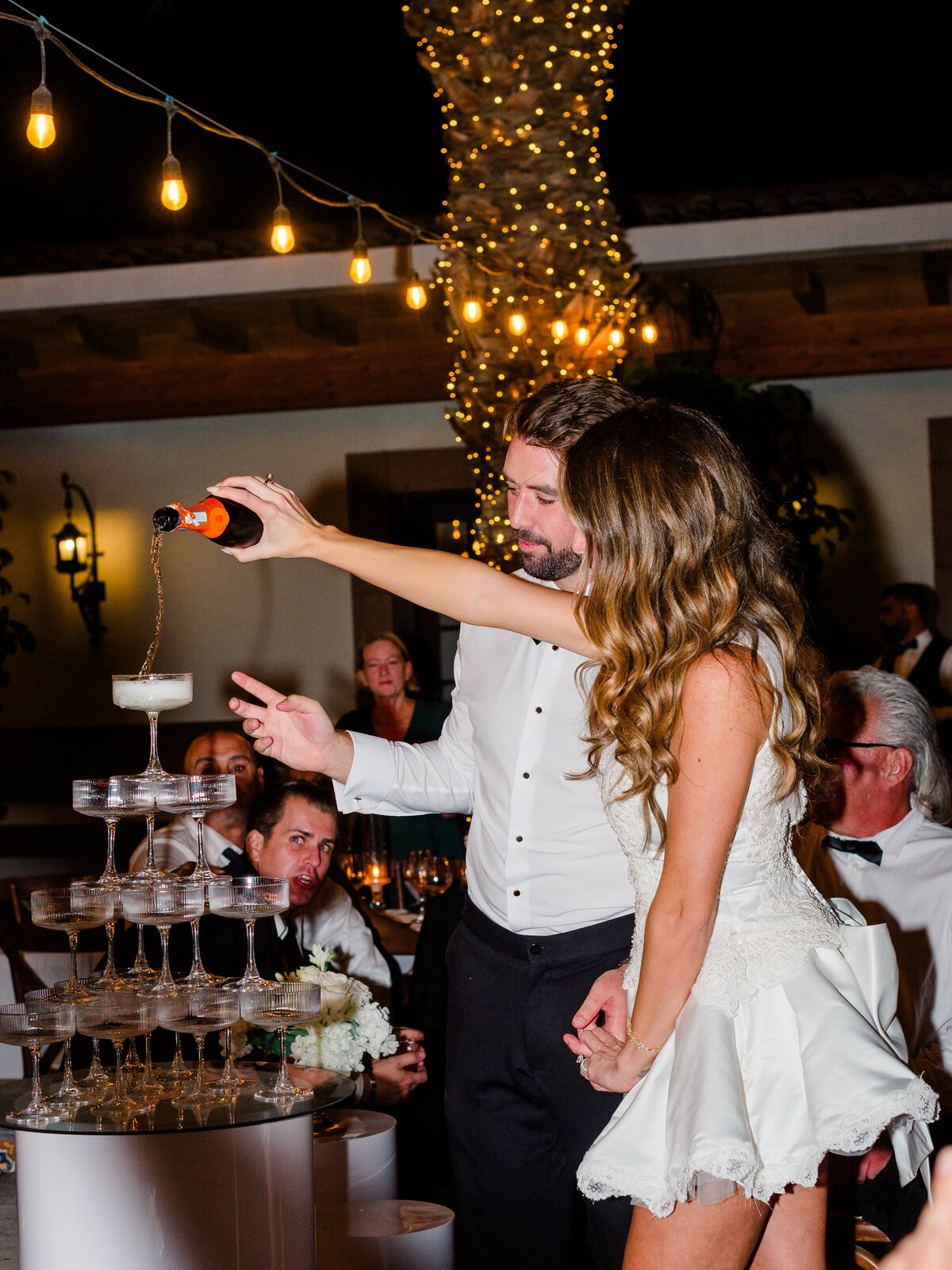 champagne-tower-toast-tara-tyler-afterparty.jpg
