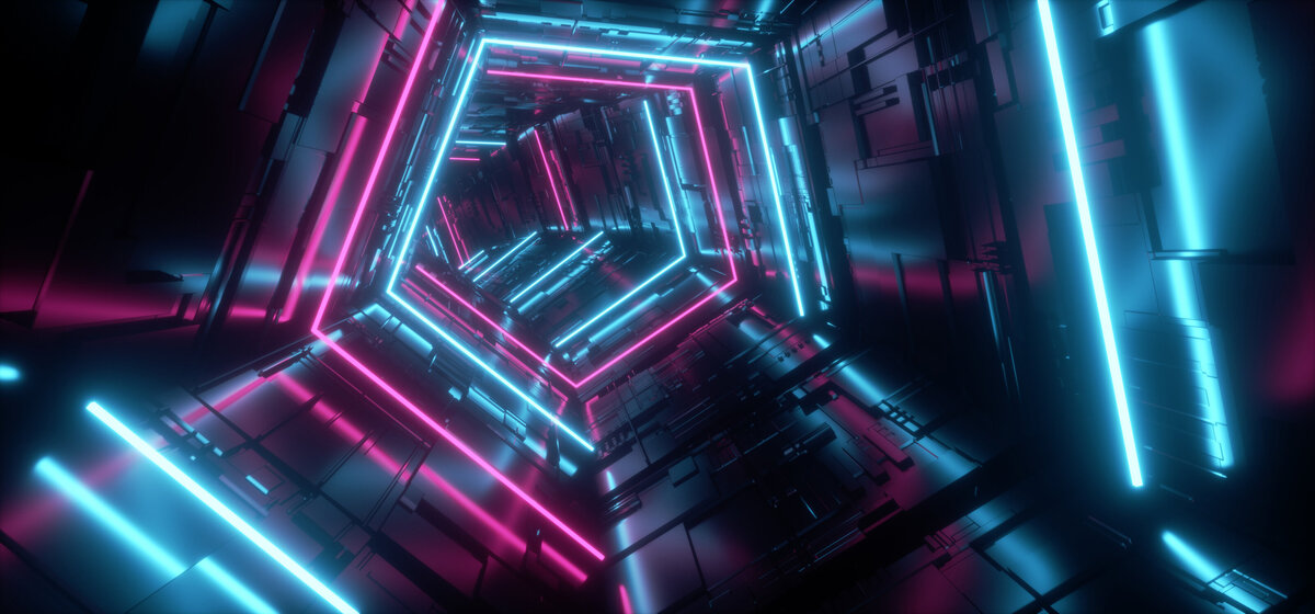 Stock photo of pentagonal neon cyan and magenta lights forming a tunnel from iStock