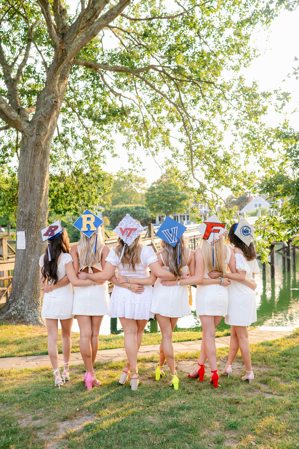 NJ senior photoshoot fun friends shoot cap and gown spring lak sea girt beach shoot white dresses-370