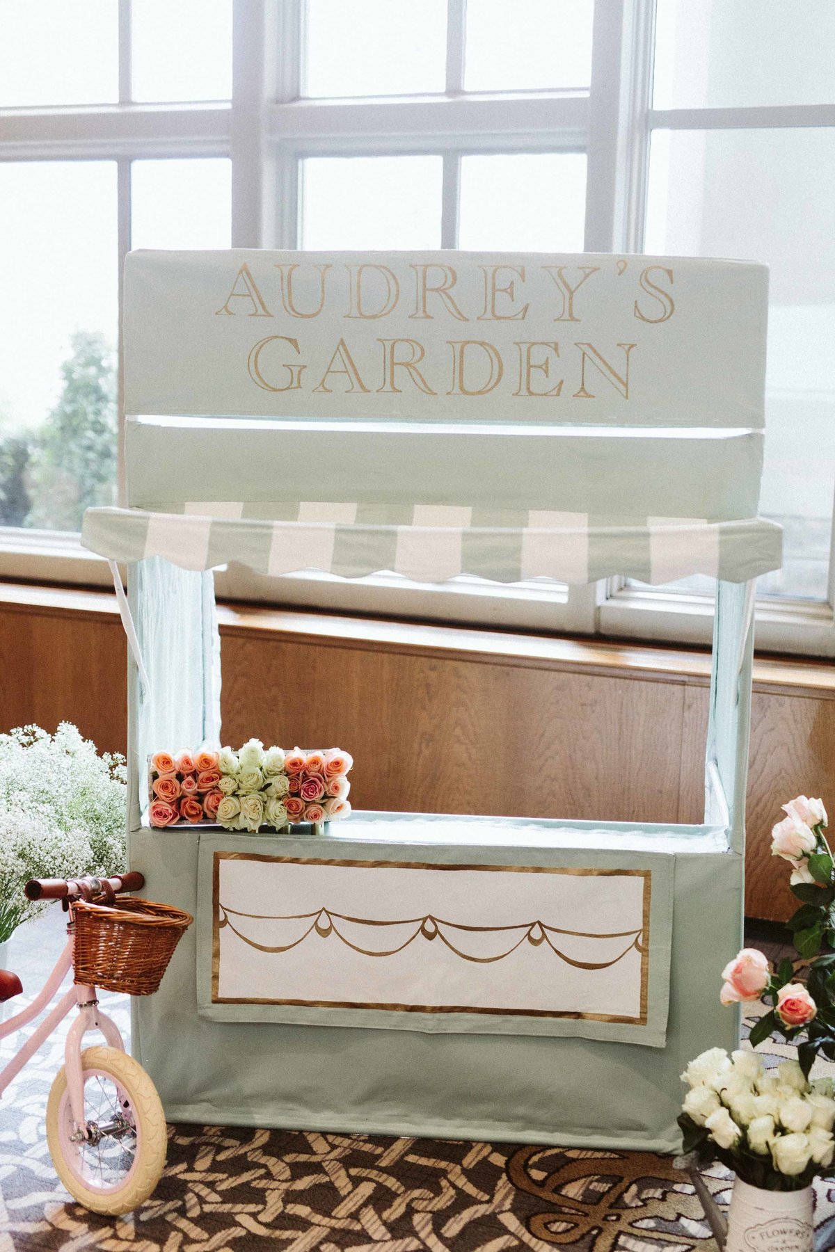 Audrey's garden flower booth decor ideas 1st birthday party