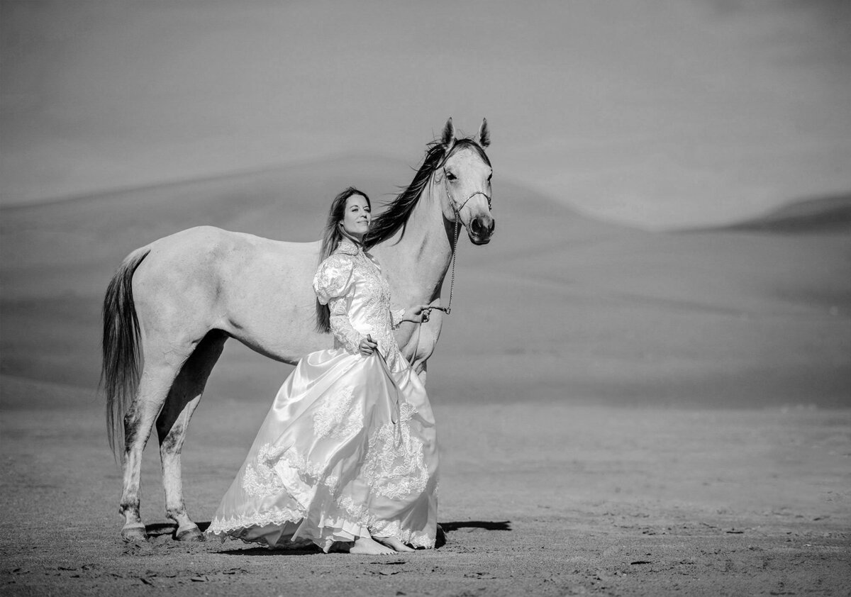 Desert Bride with Horsse Ras al Khaimah Weddings by Saskia Marlo h female wedding photographer UAE