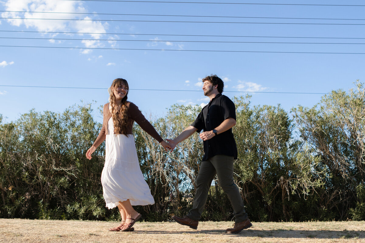 Jovanna G Photography. Classic, sophisticated Wedding Photos. Soft romantic engagement photos. Soft romantic WeddingPhotos. Sophisticated Wedding Photographer. Professional Wedding Photographer. Destination Wedding Photographer. Luxury Wedding photographer. Traveling Wedding Photographer. AZ Wedding Photographer. Gilbert AZ Wedding Photographer. Queen Creek Wedding Photographer. Phoenix Wedding Photographer. Scottsdale Wedding Photographer. Flagstaff Wedding Photographer. SoCal Wedding Photographer. California Wedding Photographer. Northern California Wedding Photographer. Southern California Wedding Photographer. San Francisco Wedding Photographer. Bay Area Wedding Photographer. San Jose Wedding Photographer. Golden Gate Bridge Wedding Photographer. Beach Lover Wedding Photographer. Palace of the Fine Arts Wedding Photographer. Ocean Lover. I love California. Orange County Wedding Photographer. Newport Beach Couples Photographer. Newport Beach Wedding Photographer. Laguna Beach Couples Beach Engagement Photographer. Laguna Beach wedding beach photographer. Los Angeles Wedding Photographer. Young and in love engaged couples who live in southern California. Christian Young Couple. Young Engaged Couple. Engaged High School Christian Couple. Christian Values. Young conservative Christian women. Young Conservative Christian men. Young Conservative Christian Couple. Young Christian Couple Engaged in High School. Young Christian College Couple. Lakeside Lovers in the Autumn Sun. David & Grace - engagement photos. Jovanna G Photographer Engagement Photos. Arizona sun shining through autumn trees- engagement. Chandler, AZ Engagement Photos. Chandler, AZ 2026 bride. Chandler, AZ Wedding Photographer. Chandler, AZ Young Engaged Couple. Girl in her 20s. Engaged Arizona Girl in her 20s. Lakeside Engagement photos. AZ Lakeside Engagement Photos. AZ Weeping Willow Lakeside Proposal. Arizona Lakeside Proposal with weeping willow tree. Detail shot of engagement ring on Arizona Lakeside estate. Chandler, AZ Lakeside Estate Proposal Outfit Inspiration.